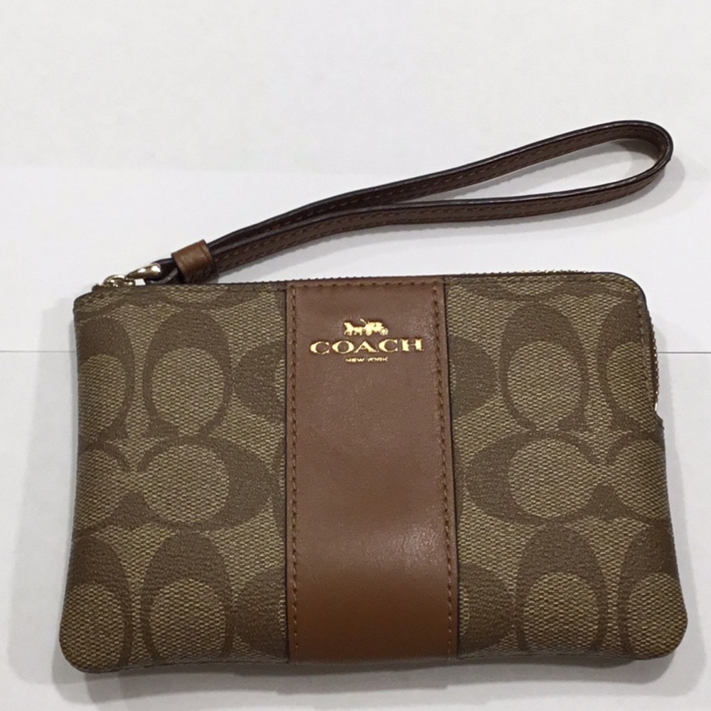 Coach mini purse 6-1/4” x 4-1/8” slightly used.